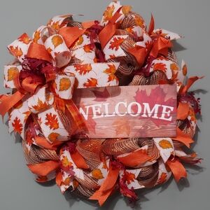 Festive Autumn Wreath with Orange and Brown Leaves